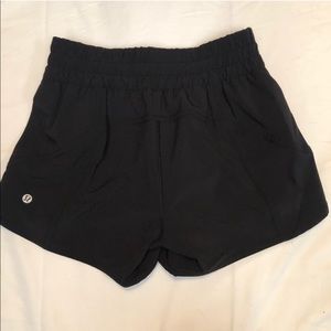 BLACK LULULEMON TRACKER SHORTS EUC